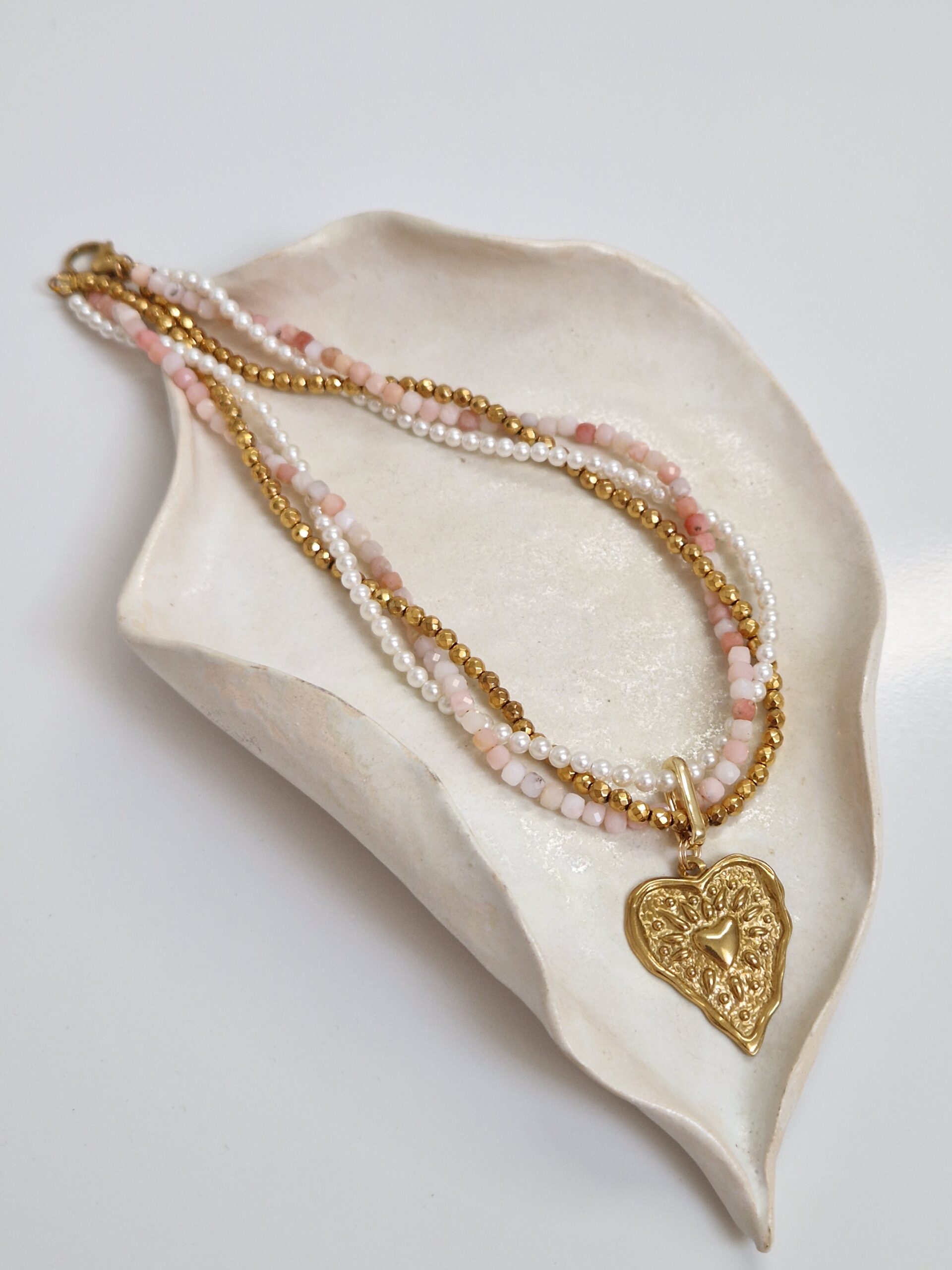 Naszyjnik pleciony z różowym opalem